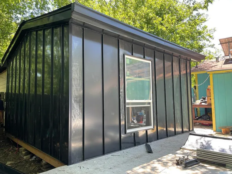 Black standing seam metal wall panels for Roof Inspection in Timberlake