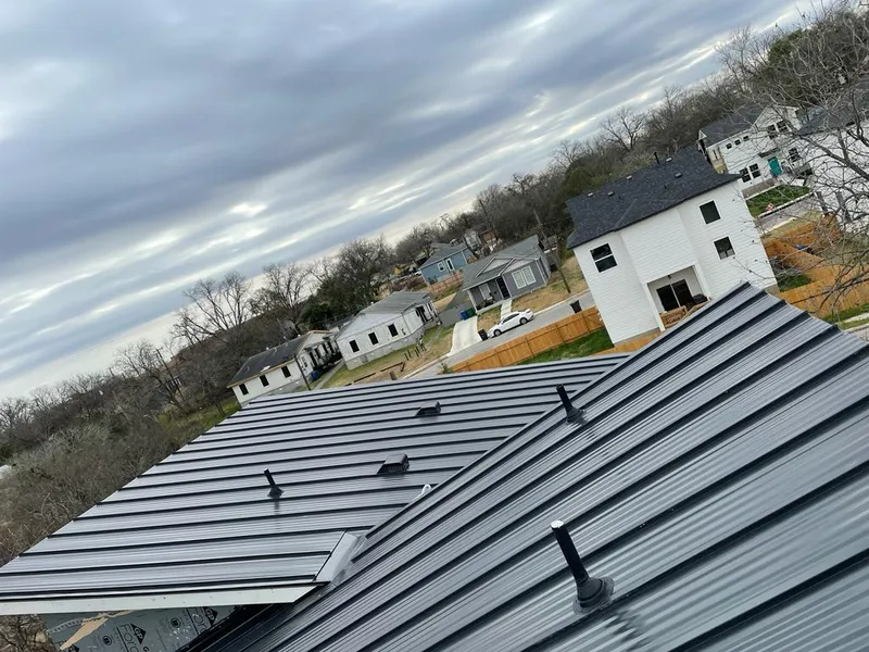 Standing seam metal roof panels with vents for Skylight Repair in Timberlake